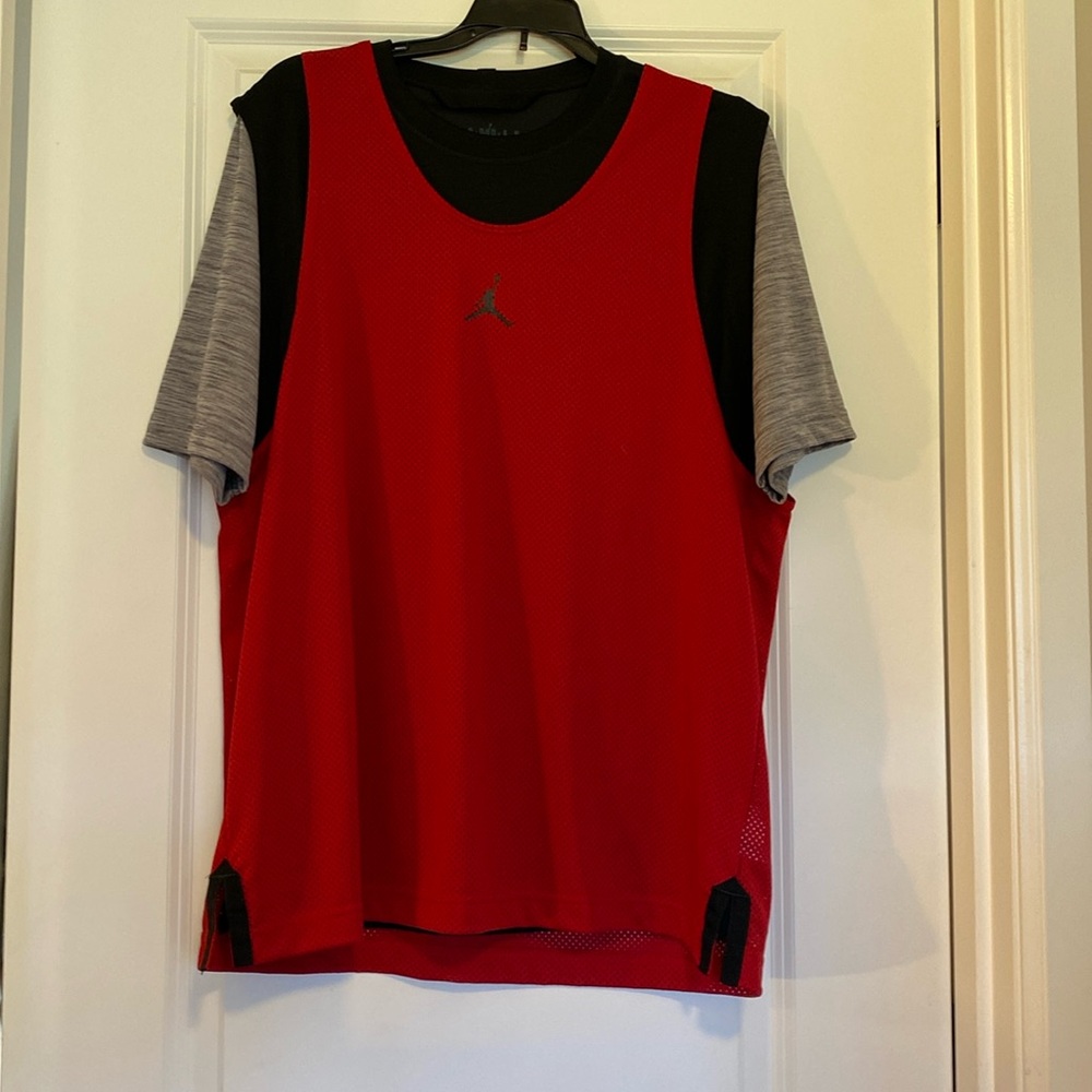 Jordan T-shirt with basketball jersey.